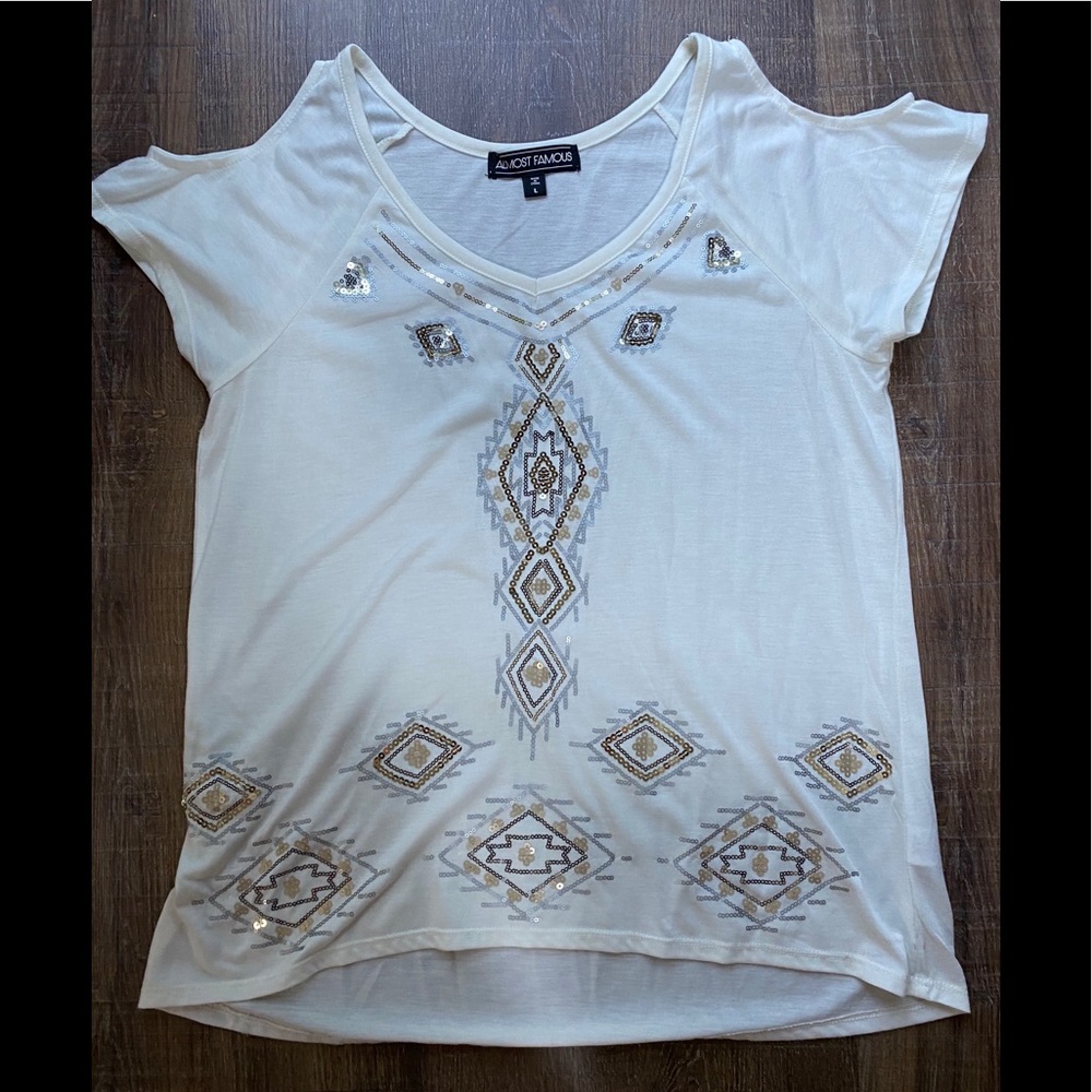 White open shoulder. Gold and silver sequin.